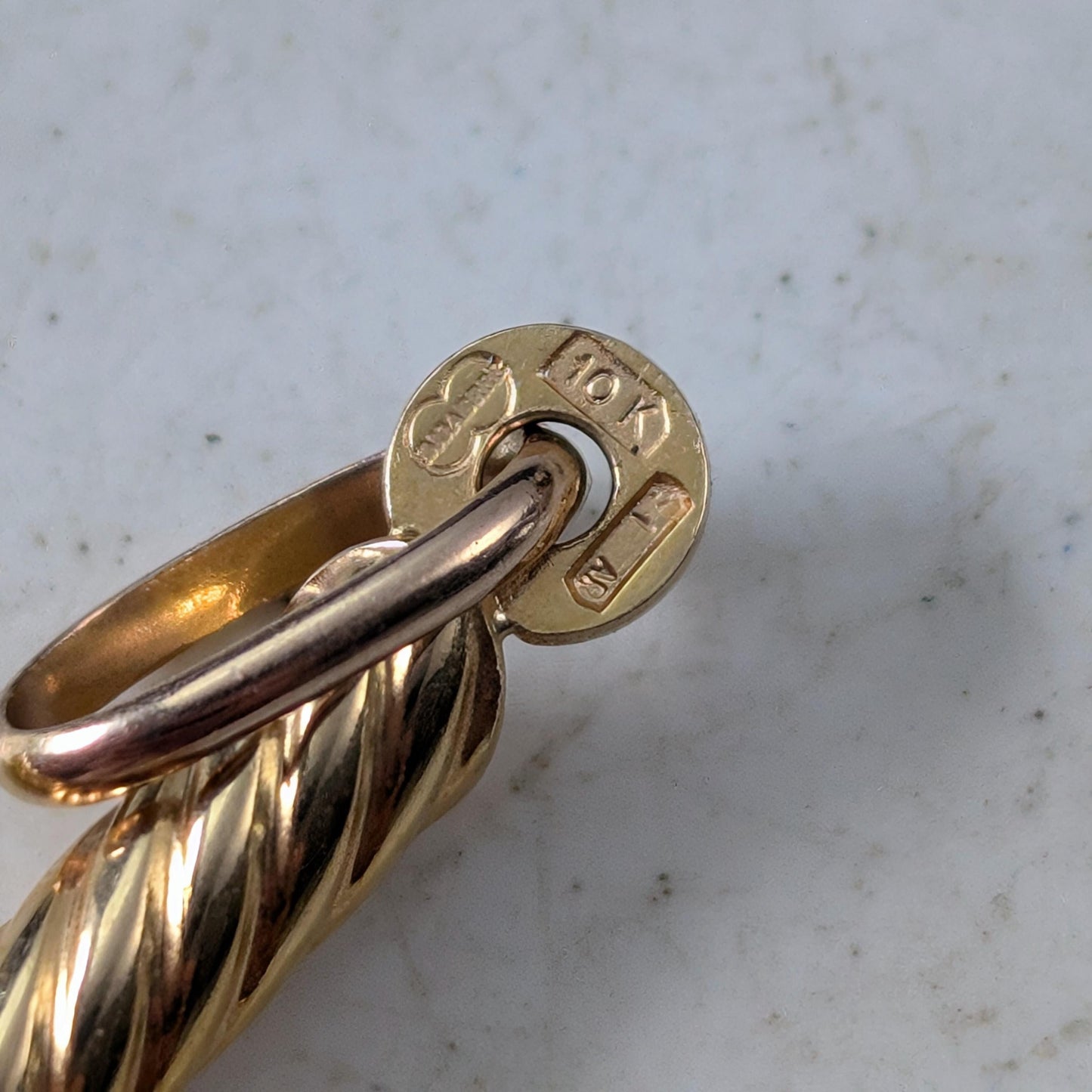 Estate Uno-A-Erre 10k Yellow Gold Twisted Cross Pendant