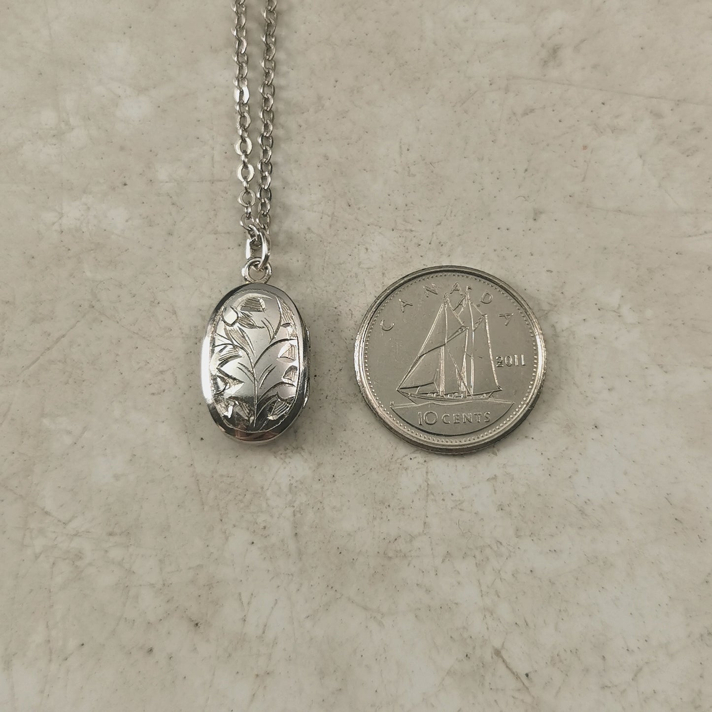 Vintage Sterling Silver Tiny Oval Locket